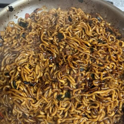 The sauce and noodles are well mixed and the chapatis are glistening.