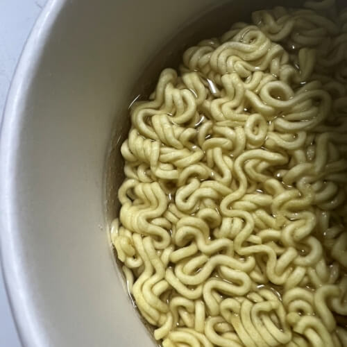 Buldak fried noodles cooked in boiling water