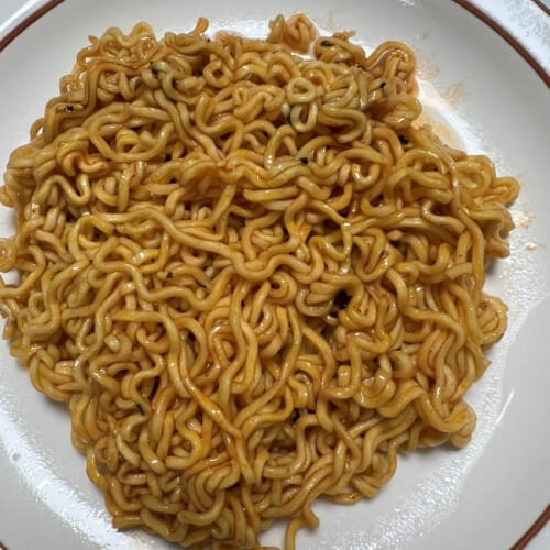 Mixed bulgogi noodles placed on a plate