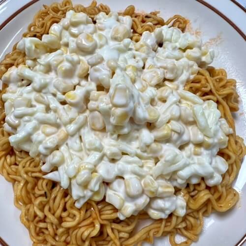 Bulgogi noodles topped with a mild corn sauce