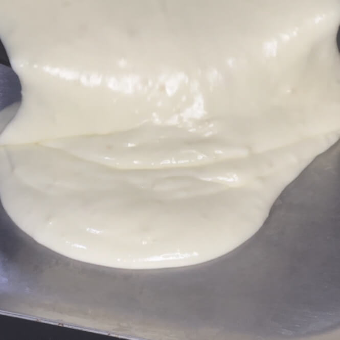 Transfer the whipped cream mixture to a large pan
