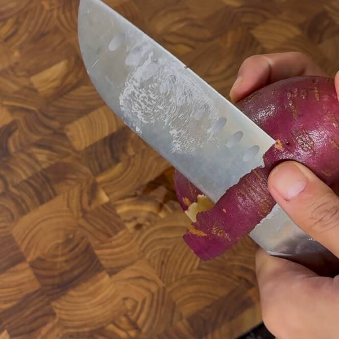Removing the skin from a sweet potato