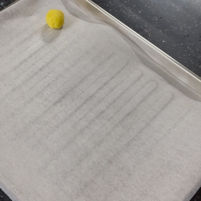 Dough resting on paper foil