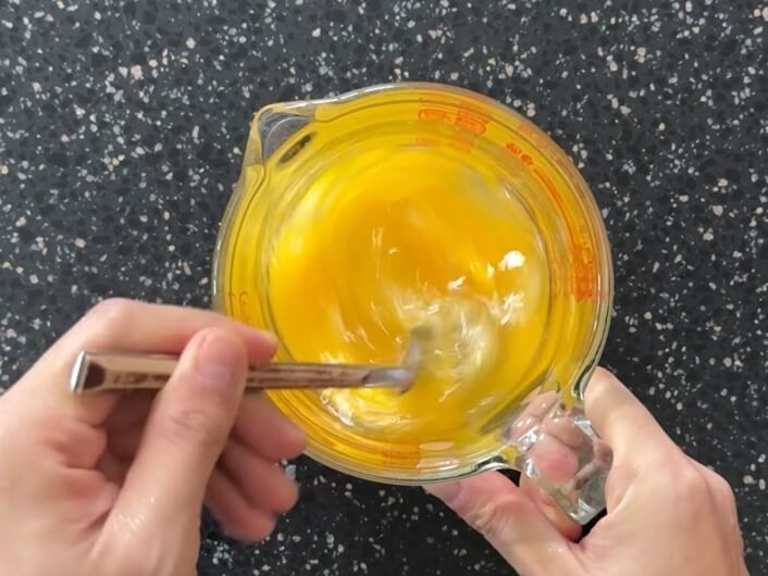 Mixing the egg wash well