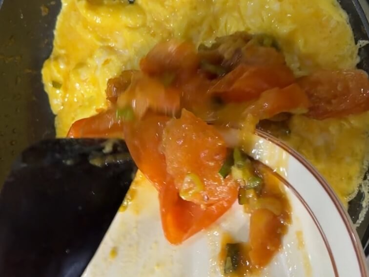 Adding the cooked tomatoes