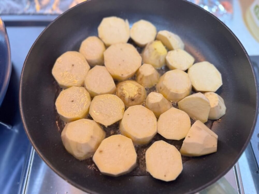 Diced sweet potatoes in a pan