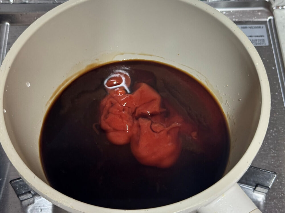 Adding all of the teriyaki sauce ingredients to the pot.