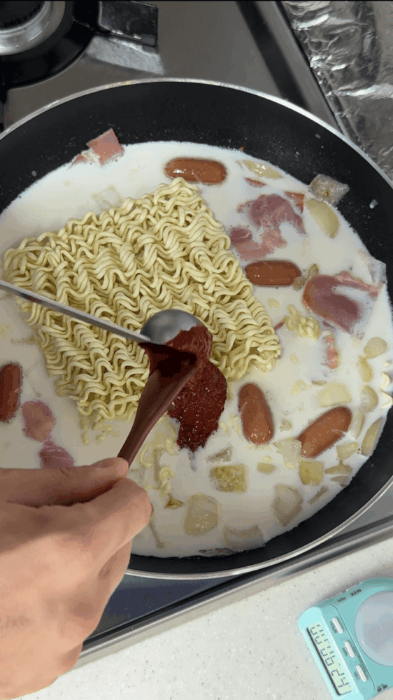 Adding the gochujang