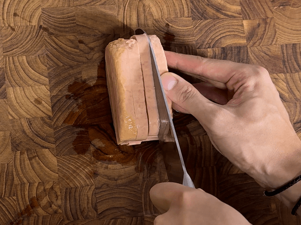 Turning the spam on its side again and cutting it into quarters to make 12 pieces