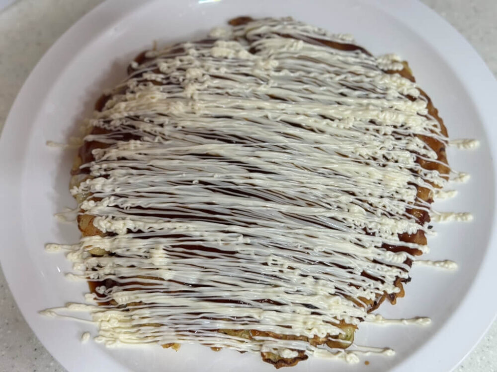 Okonomiyaki with mayonnaise on top