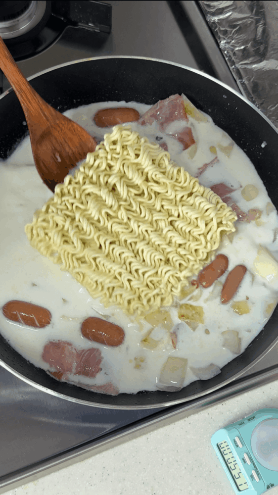 Adding ramen noodles
