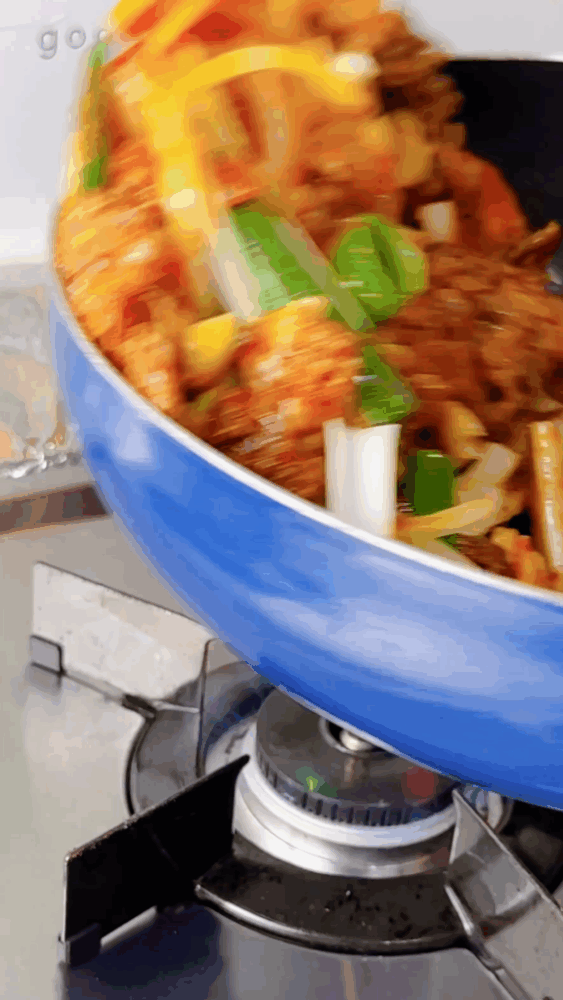 Stir-frying vegetables with pork