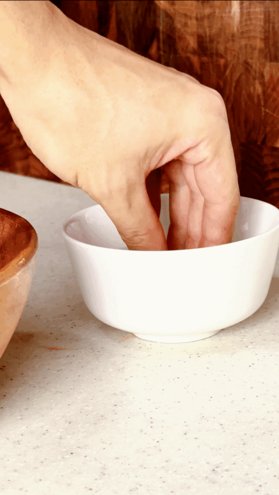 Dipping your hand into salt water